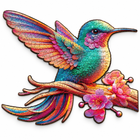 Completed rainbow hummingbird wooden jigsaw puzzle with visible interlocking pieces on a white studio background