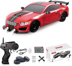 Red toy car with black stripes and remote control on a white background