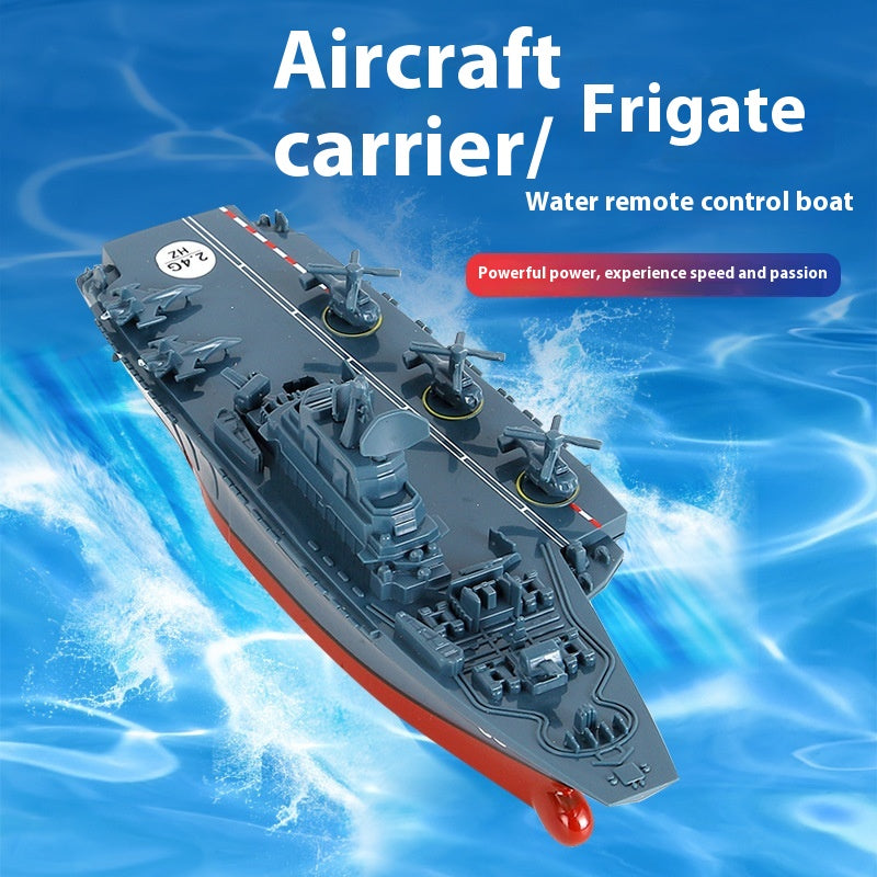 Model of an aircraft carrier/frigate on water with text about a remote control boat.