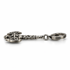 Side profile of the double axe pendant keychain showing blade edge and thickness