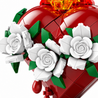 Close-up of the Sacred Heart building-block model’s white rose bricks, green leaves and glossy red heart panels.