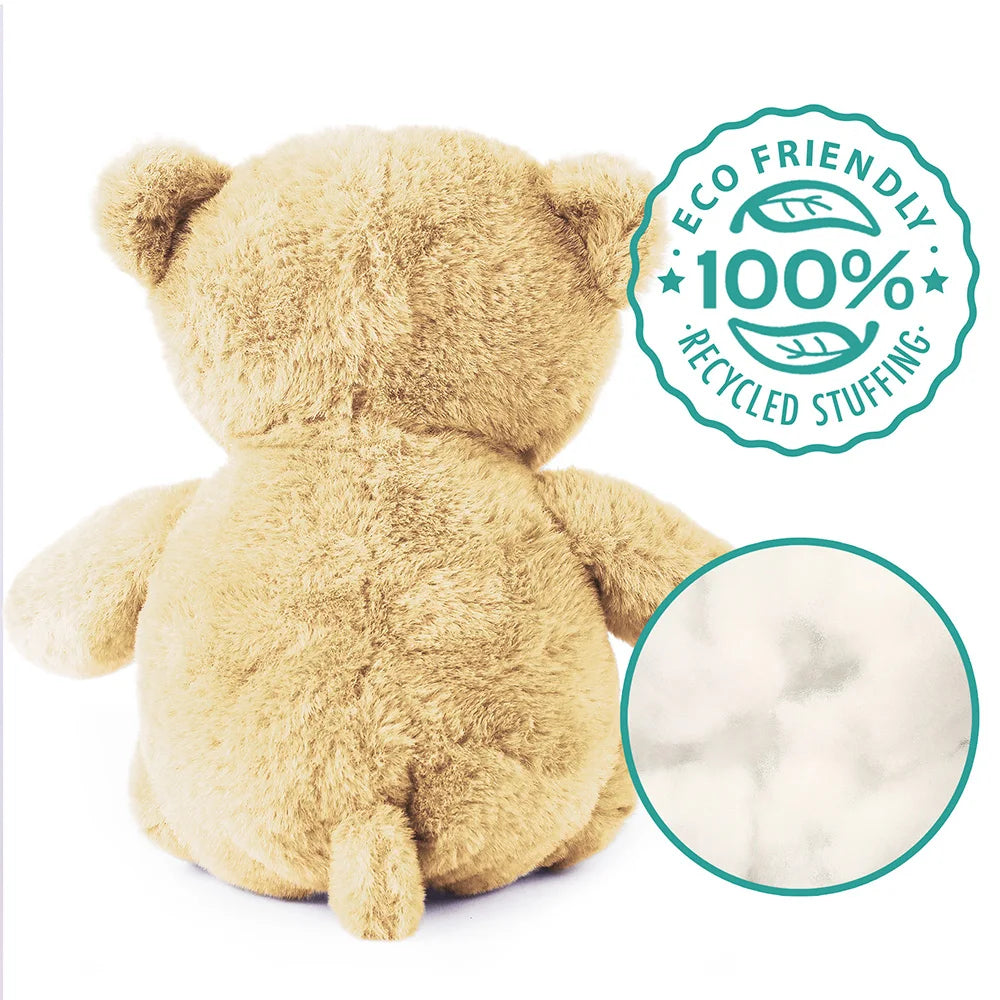 Beige teddy bear with eco-friendly stuffing label on a white background