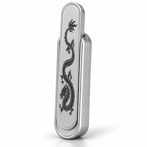 Silver metal magnetic push card fidget with engraved dragon, standing upright on white