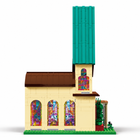 Side profile of the Springfield church building-block model showing teal steeple and stained glass