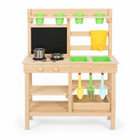 Front view of wooden mud kitchen showing storage shelves and hanging garden tools