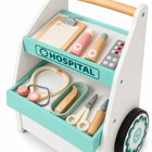 Elevated storage detail of the medical trolley with trays, tools and decorative wheel.