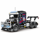 Black 2,202-piece heavy semi-tractor truck building block model on a white studio background