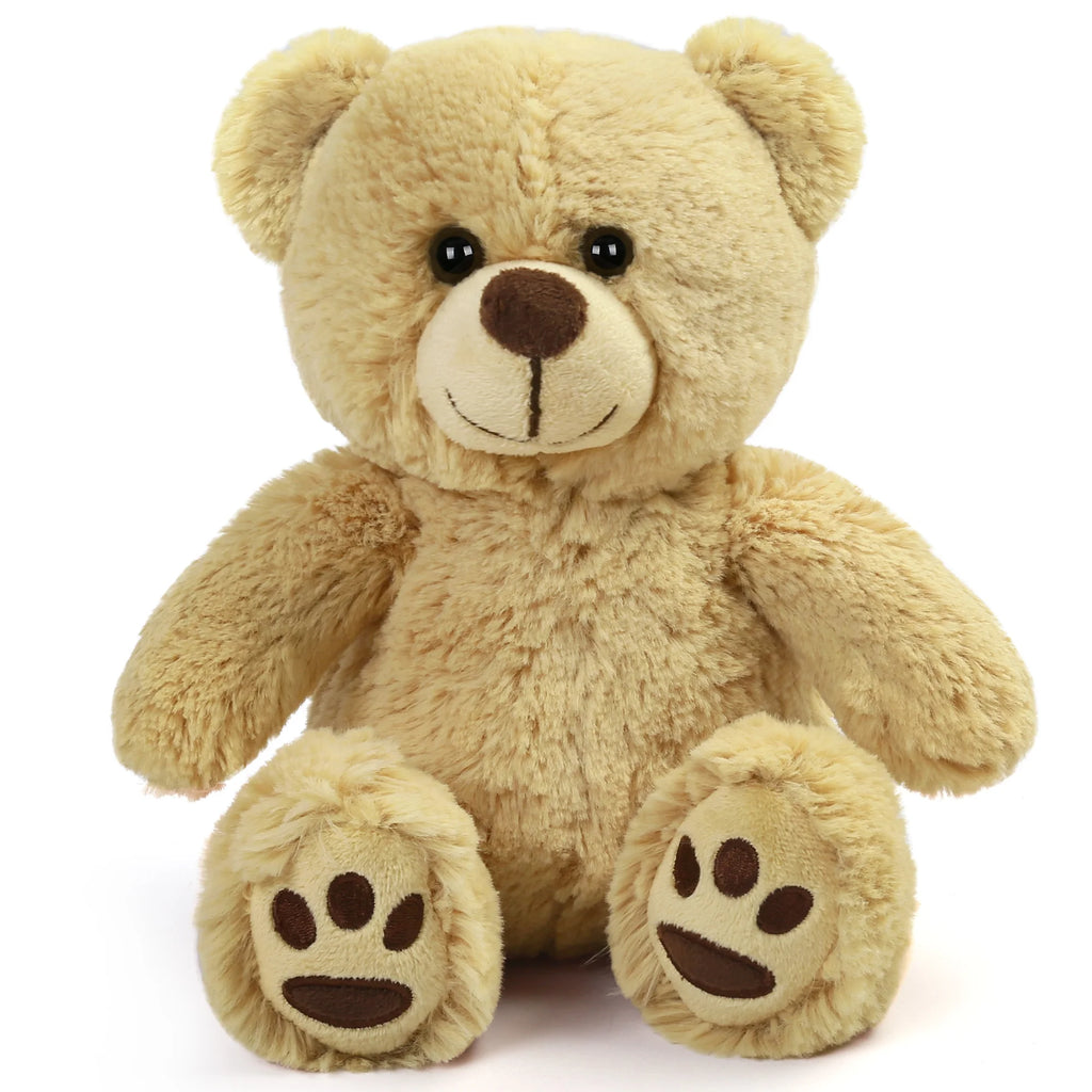 Beige teddy bear with brown paws and nose on a white background