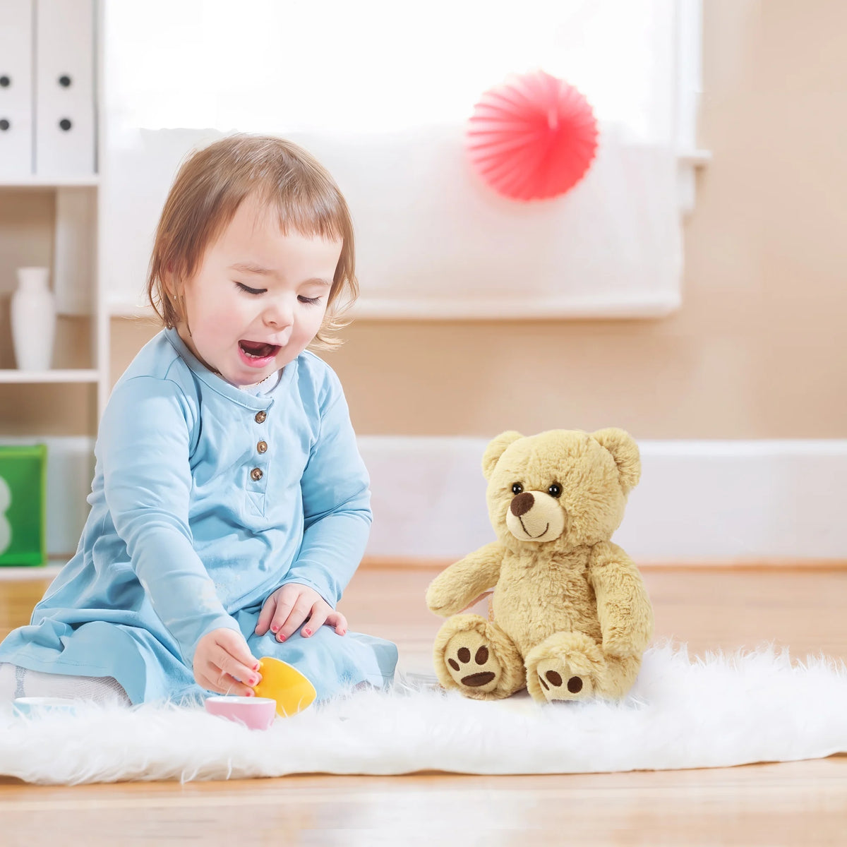 The classic teddy bear sitting on a nursery shelf as a charming and cozy room ornament.