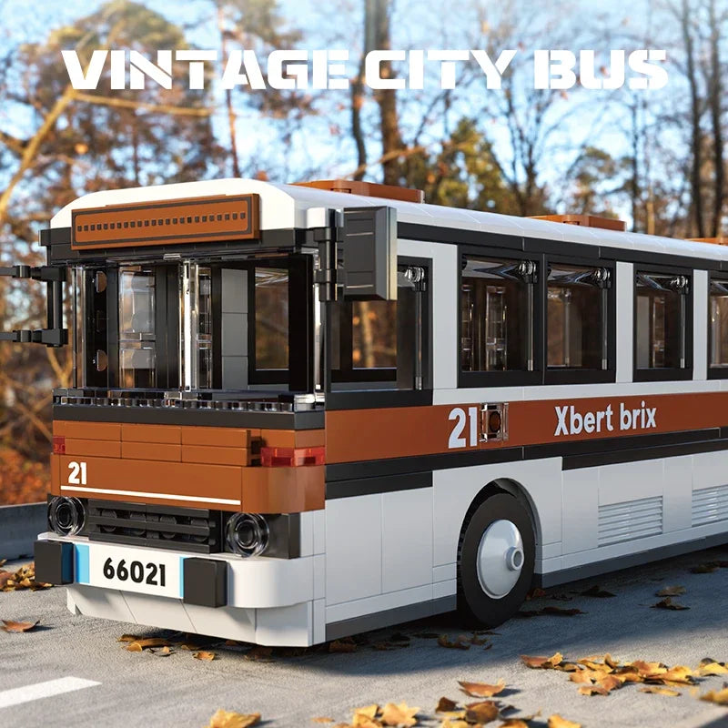 vintage city bus building blocks model displayed on a road with autumn trees in the background