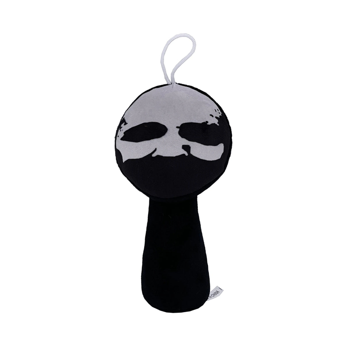 Black and white cartoon character plush toy with face design on a white background by Toylvia