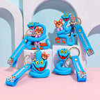 Set of blue cartoon snake keychains with different poses and straps, displayed together on pastel blocks