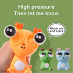 Orange pop-out eyes dragon squeeze fidget toy under pressure with eyes popping out for stress relief