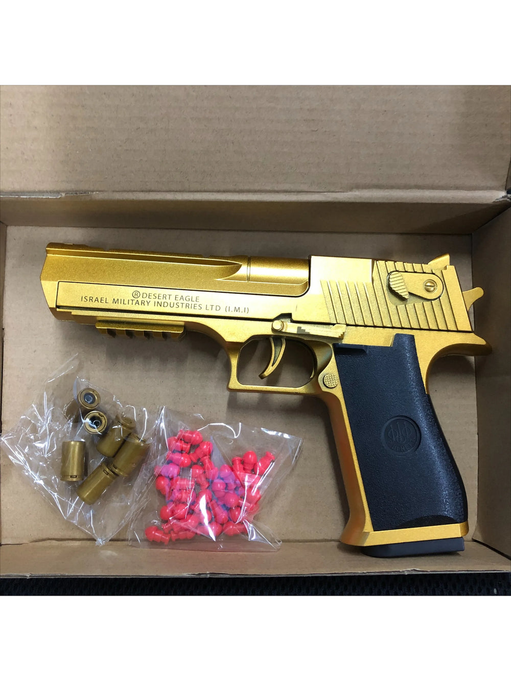 Gold Desert Eagle shell-ejecting toy gun complete package – Toylvia