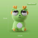 Light green pop-out eyes dragon squeeze fidget toy with size measurements shown on green background