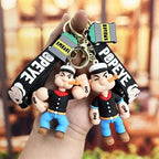 Toylvia Popeye Kawaii Keychain with cartoon PVC figure and printed strap held in hand.