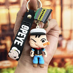 Toylvia Popeye Kawaii Keychain held in hand with cartoon PVC figure and POPEYE strap.