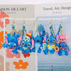 Stitch Christmas keychain attached to a bag zipper as festive bag decoration