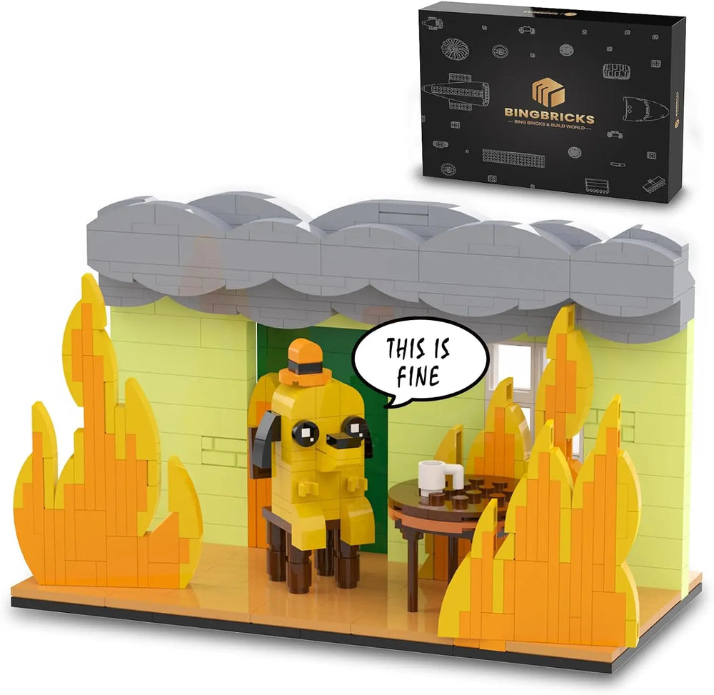403PCS ‘This Is Fine’ dog building block set shown with its black packaging box, featuring flames, smoke roof, and seated dog figure, collectible model by Toylvia.
