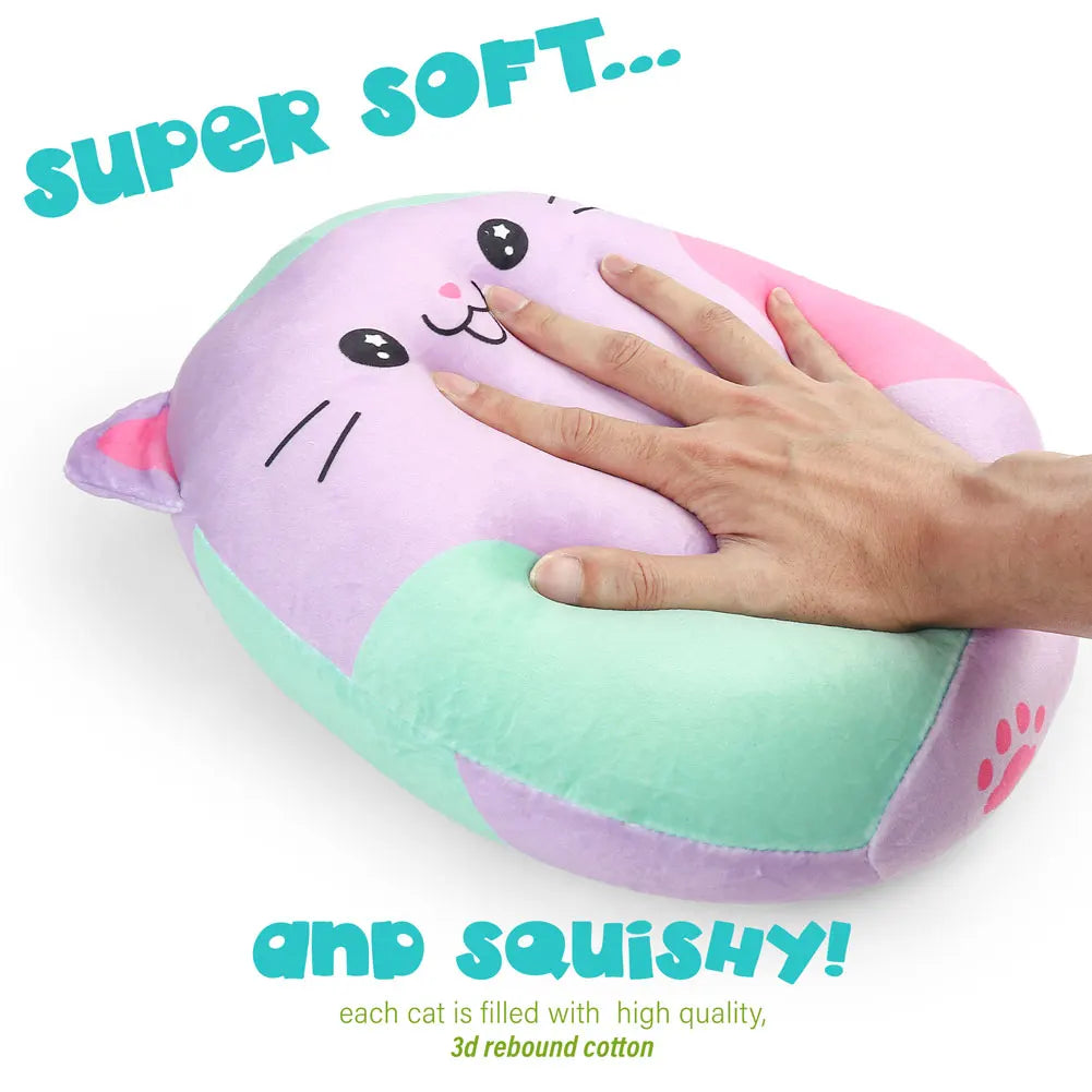 Plush cat-shaped pillow with a hand pressing on it, text indicating softness and squishiness.