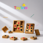 Two different wooden Huarong Road logic puzzle boards shown together with scattered sliding pieces.